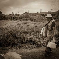 2016-8-10 在田邊溪澗釣山斑魚，是一些當地居民的兒時活動。這種獨特的鄉郊生活，在農地被發展後將會一拼消失。